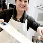 Lady holding cutting board